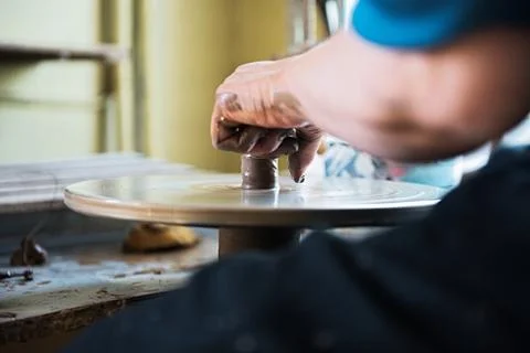 A lace maker and ceramicist create artwork Stock Photos