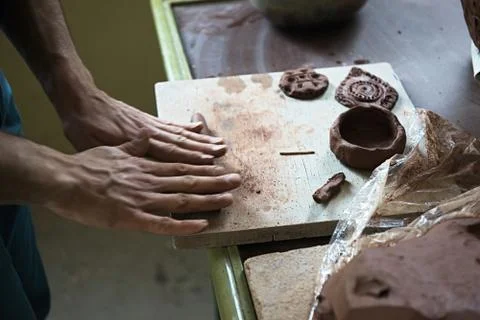 A lace maker and ceramicist create artwork Stock Photos