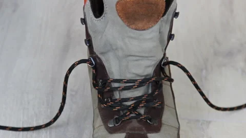 Lacing Up the Boots . Close up of shoes. Stock Footage 130532091