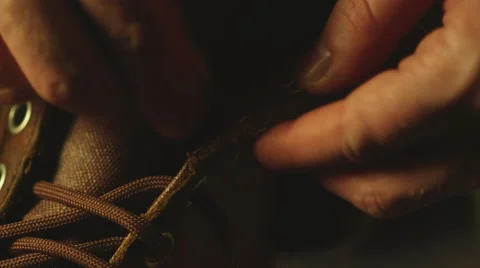 Lacing a canvas boot Video stock 51906343