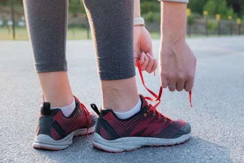 Lacing up running shoes Stock Photos
