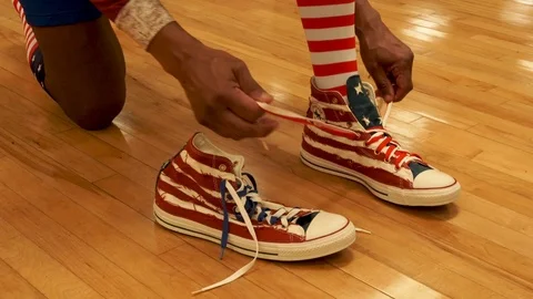 Lacing up sneekers Stock Footage 125492583