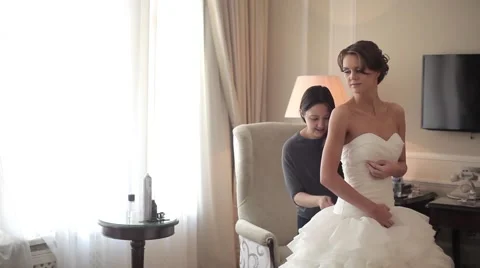 Lacing of a Wedding Dress Stock Footage 50710079