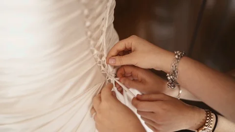 Lacing wedding dress. Stock Footage 92416920