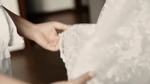 Lacing wedding dress. Stock Footage 94839574