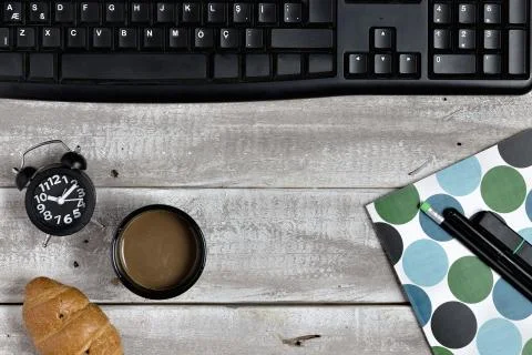 Lack computer keyboard on rustic, damaged wooden table Stock Photos