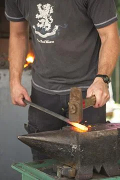 Lacksmith tools and actions forging iron.. Stock Photos
