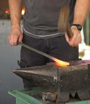 Lacksmith tools and actions forging iron.. Stock Photos