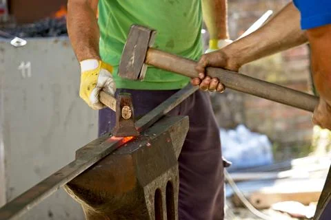 Lacksmith tools and actions forging iron.. Stock Photos