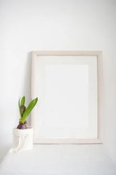 Laconic frame on the bedside table Stock Photos