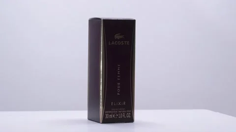 Lacoste Elixir. Box with Perfume bottle rotation in studio Stock-Footage 171763726