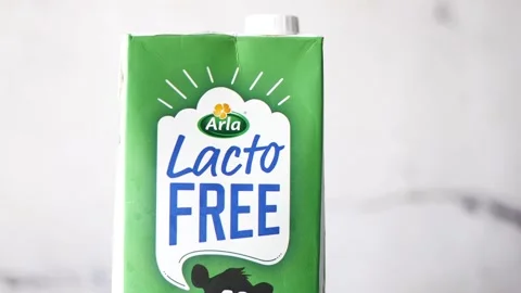 Lacto free milk in container Stock Footage 188877599