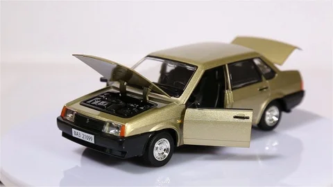 Lada scale model russian retro car is rotating isolated on white background. Video stock 102958288