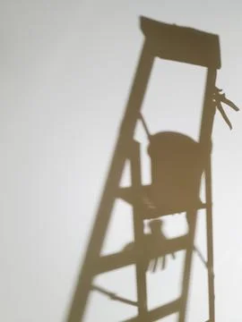 Ladder on the background of the wall Stock Photos
