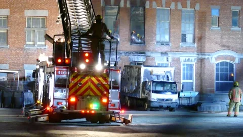 Ladder erected at old building fire Video stock 139664403