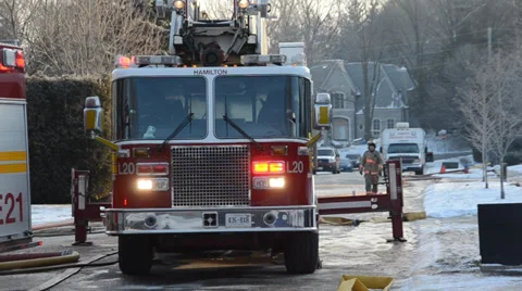 Ladder Fire Truck Setup At Fire Scene in Winter Stock Footage 35697909
