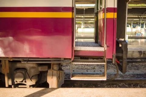 Ladder to lower class train car on train station Stock Photos