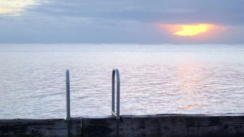 Ladder on pier during sunset Video stock 168480734