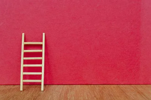 Ladder with red background with customizable space for text. Foto stock