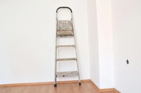 Ladder on wall Stock Photos