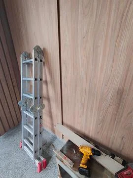 Ladders and Tools in Work Environments Stock Photos