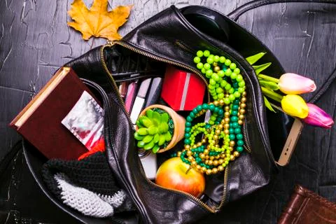Ladies bag with different things Stock Photos