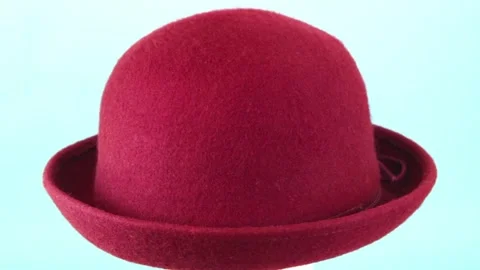 Ladies dark red felt hat with upturned brim Stock Footage 314383383