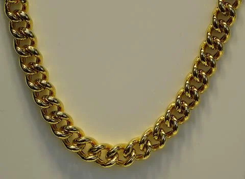 Ladies Rounded Curb Link Gold Necklace Stock Photos