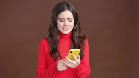 Lady answer device call insincere feelings isolated brown color background Stock Footage 189367497