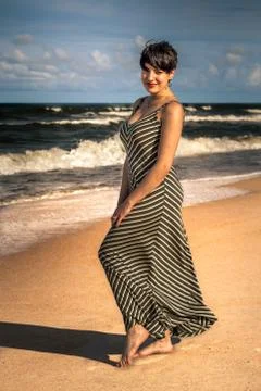 Lady on the beach Stock Photos