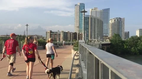 Lady Bird Bridge Austin TX with Joggers &amp; Austin Skyline Stock Footage 50227682
