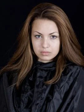 Lady in a black cape Stock Photos