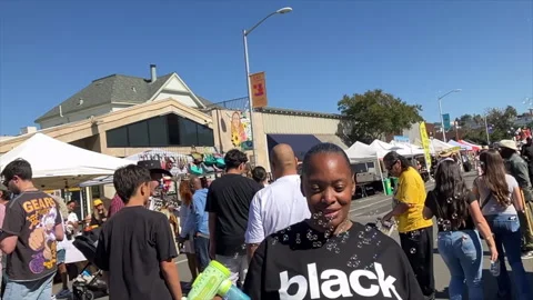 Lady Blowing Bubbles at an Oktoberfest event in California, October 5, 2025 Stock Footage 338187992