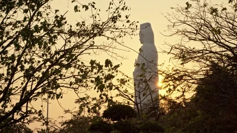 Lady Buddha Statue Da Nang Sunset and Forest Wide Shot Stock Footage 343408245
