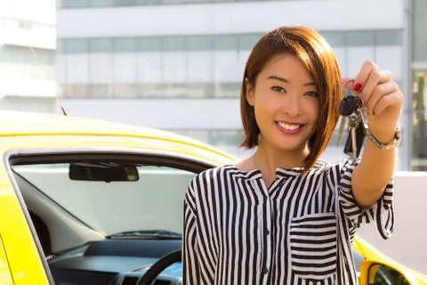 Lady with car keys Stock Photos