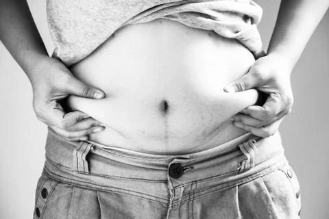 Lady catching abdominal surface Stock Photos