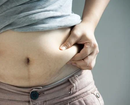 Lady catching abdominal surface Stock Photos