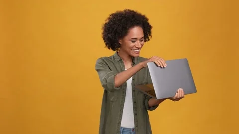 Lady ceo chat netbook close hug isolated mustard color background Stock Footage 166161715