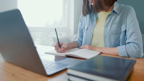 Lady ceo sit table write book use netbook colleagues webinar in comfort room Stock Footage 166216241