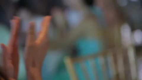 A lady claps at the holiday table Stock Footage 250624444