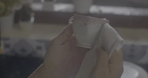 Lady cleaning the cup in kitchen Shot on Sony FS7 Stock-Footage 90900911