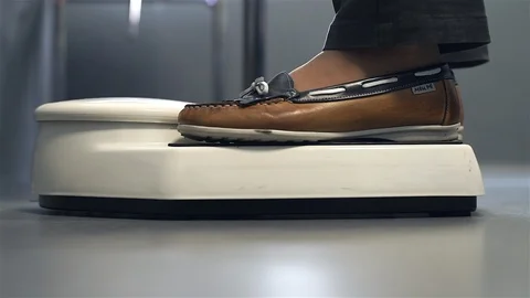 Lady Climbing to the Doctor's Scale. Stock Footage 91983760