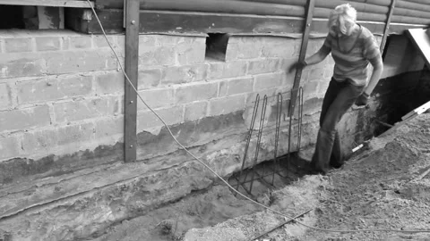 Lady conquering the foundations on the construction site #13 Stock Footage 277137380
