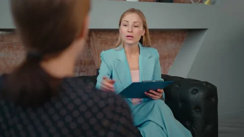 Lady at the consultation with advisor Stock Footage 232285985
