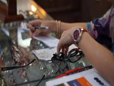 Lady counting the invoice Video stock 103892791