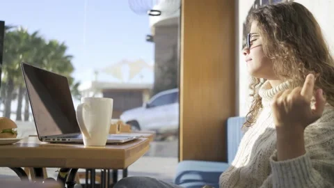 Lady creator watch notebook sitting at cafe table Stock-Footage 168283667
