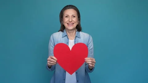 Lady cuddle card heart husband present isolated blue color background Stock Footage 167320162