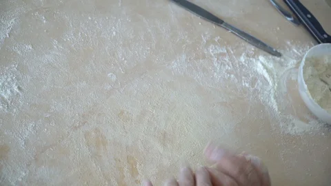 Lady cutting the pasta dough Stock Footage 128987907