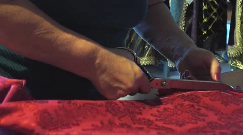 Lady cutting some fabric Stock Footage 67307712