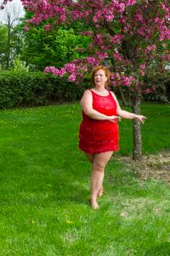 Lady dancer under a tree Stock Photos